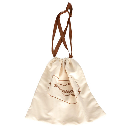 small tan dust bag closed