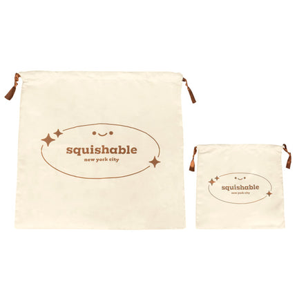 small tan dust bag size comparison